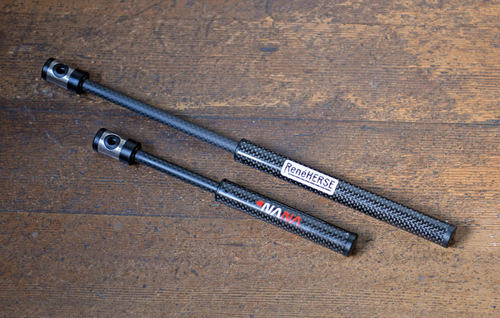 A top view of a Rene Herse NUDA Electric Bike Tire Pump on a wooden table