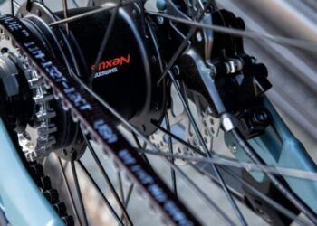 A close view of a belt drive on an electric bike