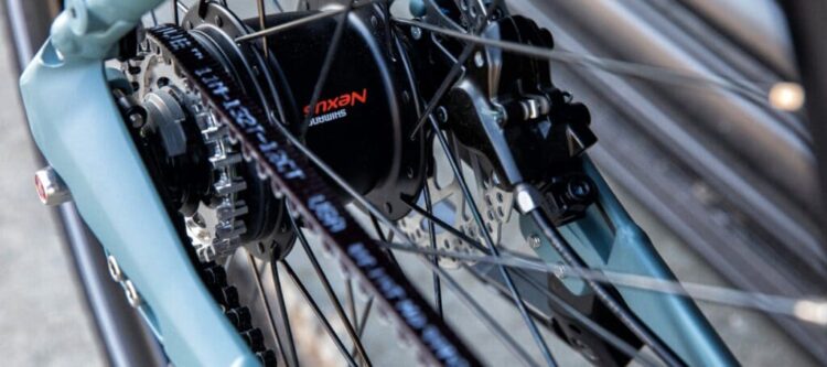 A close view of a belt drive on an electric bike