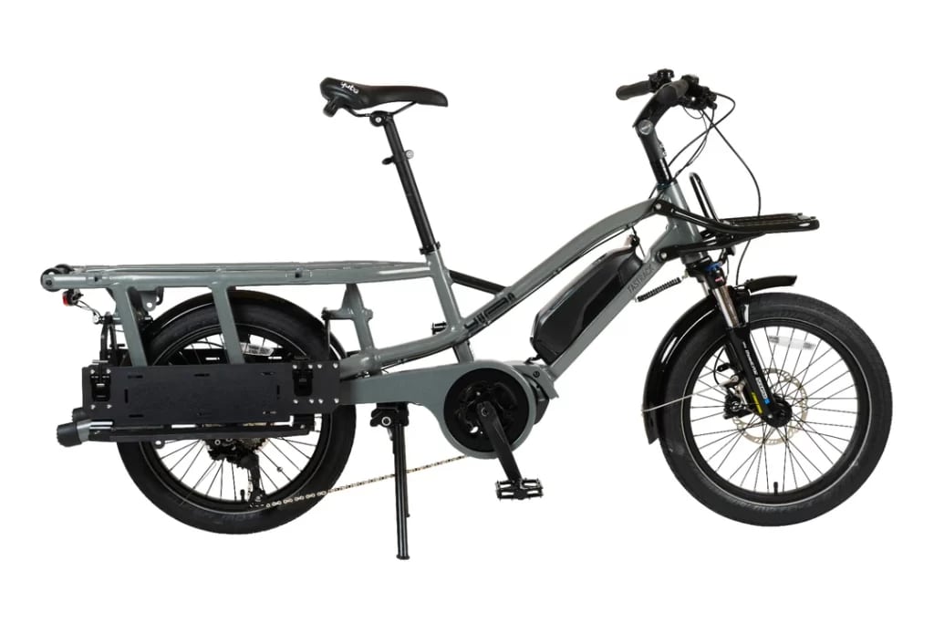 A side view of a black and grey Yuba FastTrack Cargo E Bike 