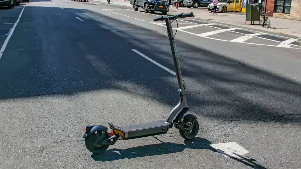 Apollo City electric scooter pared in the middle of road