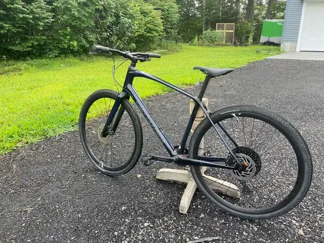 Custom Sirrus X bike parked in the middle of road