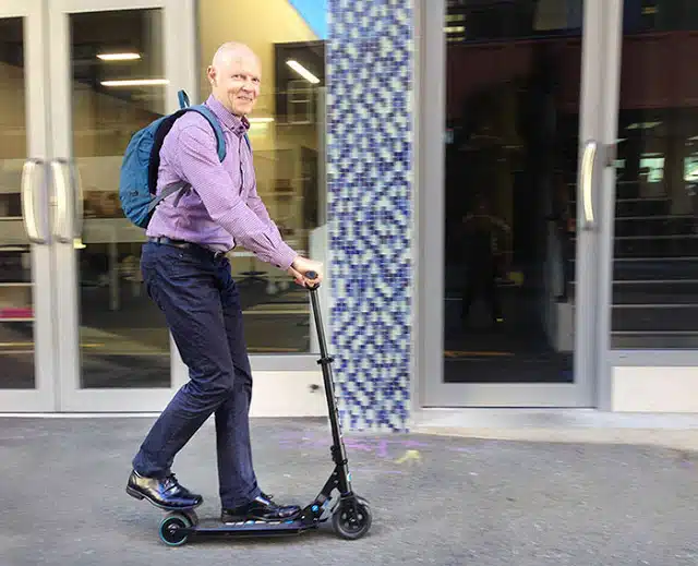 an old man on his electric scooter