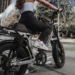 A backview of a woman paddling an e bike