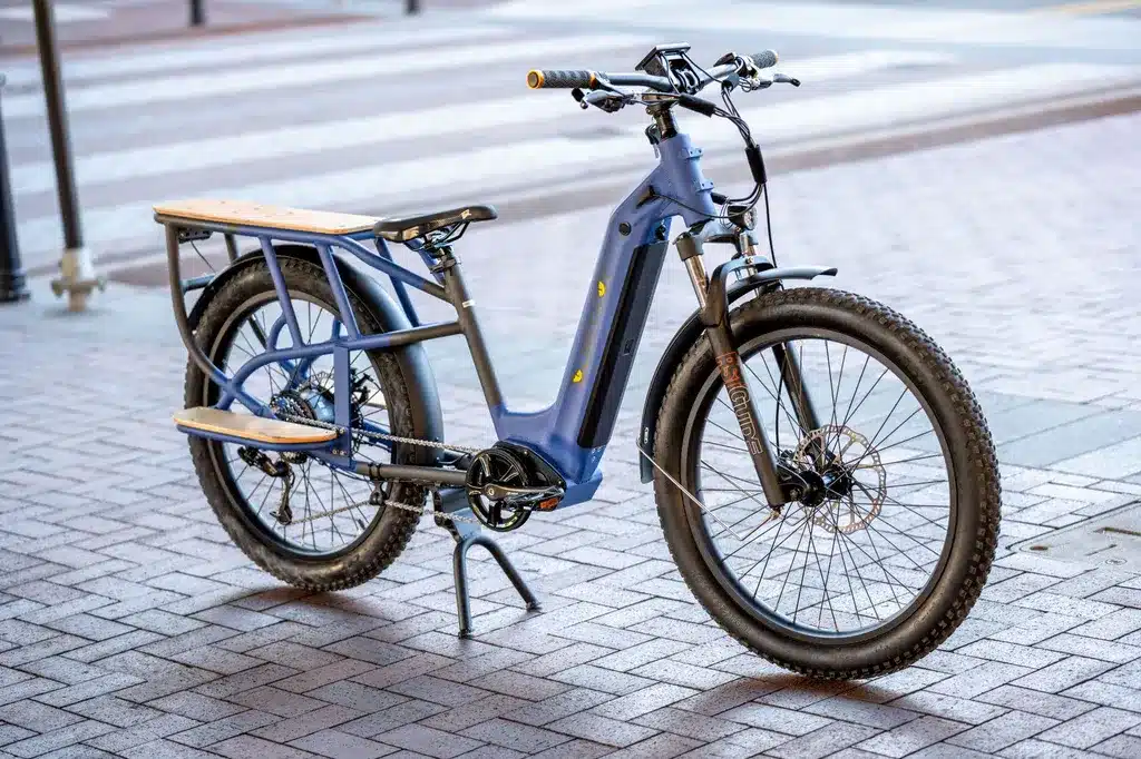 A view of a blue electric bike parked