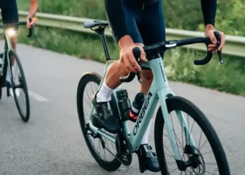 A view of a person paddling an electric road bike on road