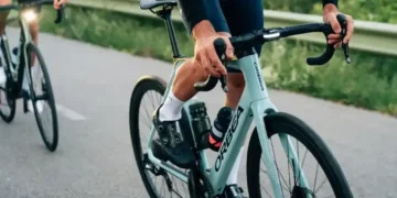A view of a person paddling an electric road bike on road