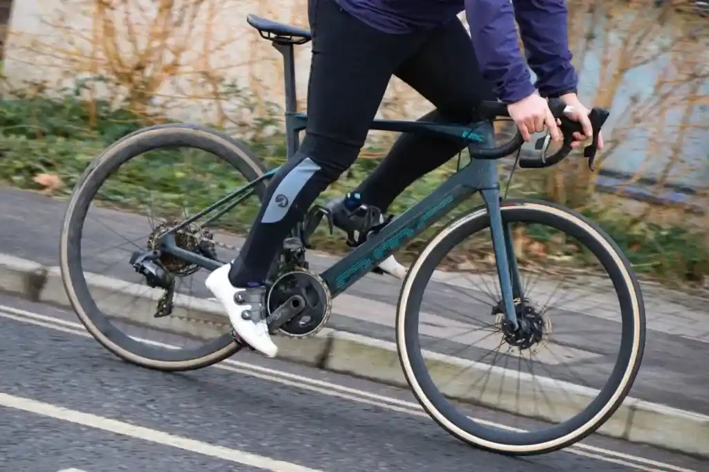 A view of a person riding a bmc road machine amp one