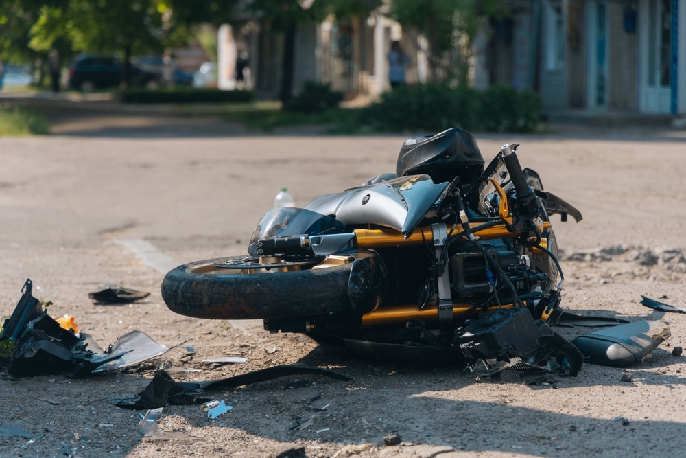 A view of a collided bike on road