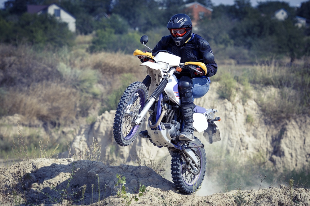 A view of a person riding bike on a dirt track