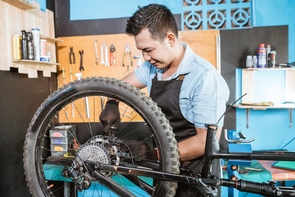 A view of a person changing bike tire