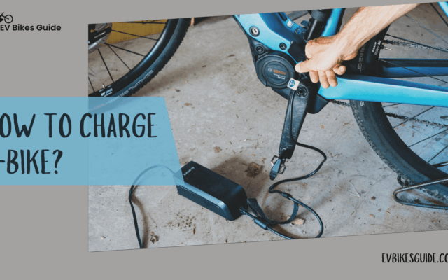 A view of a person charging a bike ( )