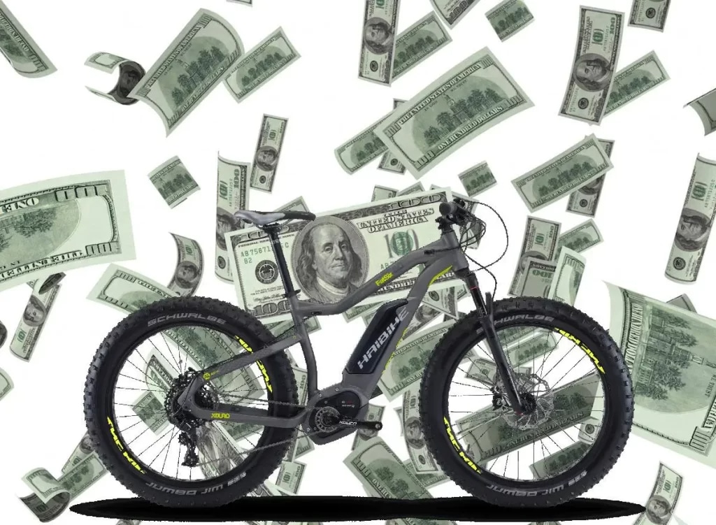 A view of an electric bike with money dollars in the air